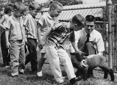 Children with lamb