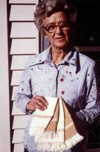 Gladys Clark with handwoven placemats, c. 1980s, from the Gladys Clark Papers, Mss. 4953, LLMVC